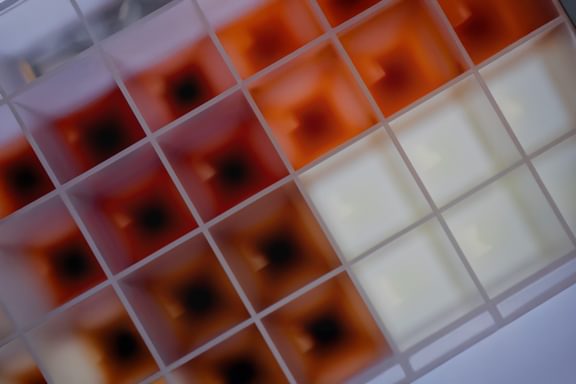 A close-up view of a red and white square, showcasing the vibrant colors and sharp edges of the geometric shape.